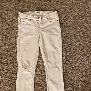 White Paige jeans with hole at knee